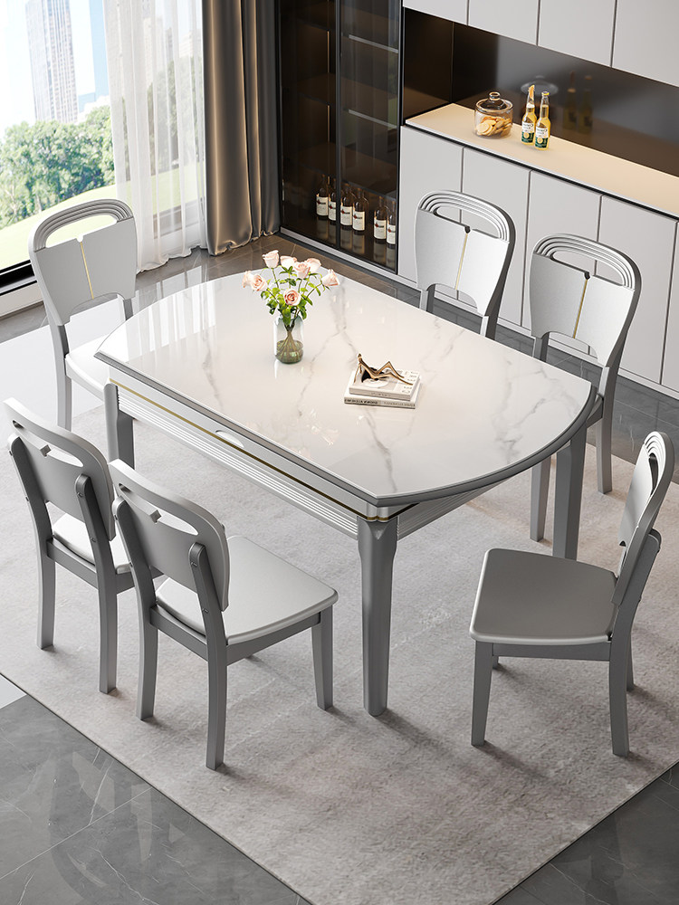 Furniture Lighting & Decor Magazine - Esstisch und Stühle aus Steinplatten, kombiniert
